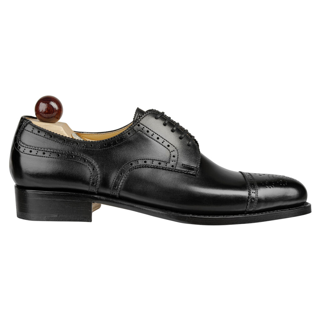 Side view-1 of men’s black Alt Wien Derby shoe on P2 last with a single sole – handmade by Vass Shoes.