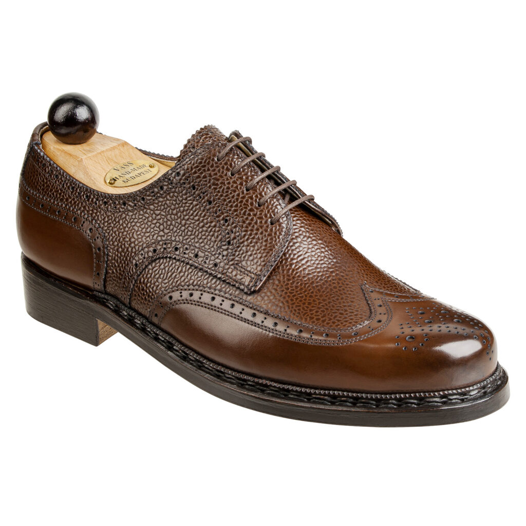 Angle view of men’s antique cognac Budapest Derby shoe on BP last with a double leather goyser sole – handmade by Vass Shoes.