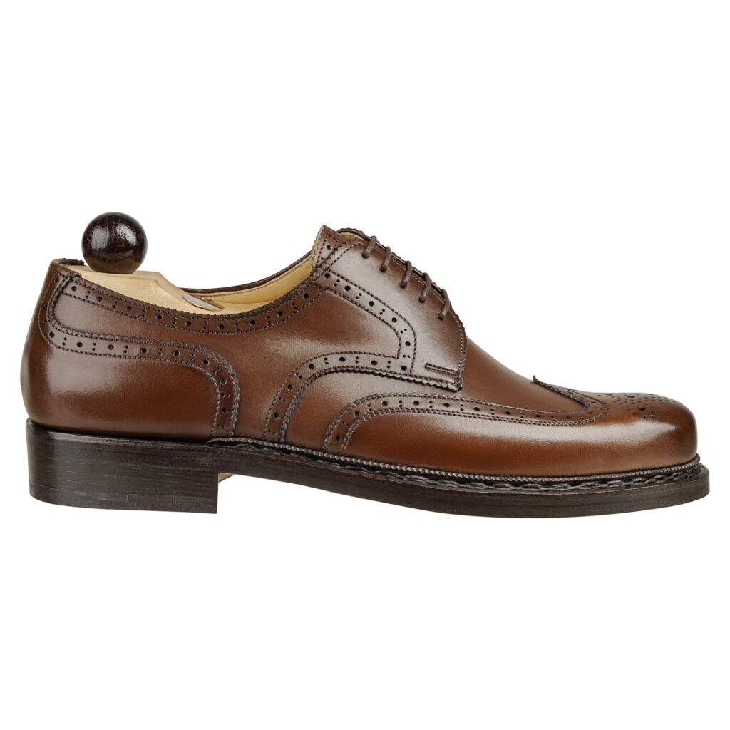 Side view-1 of men’s antique cognac Budapest Derby shoe on BP last with a double leather goyser sole – handmade by Vass Shoes.