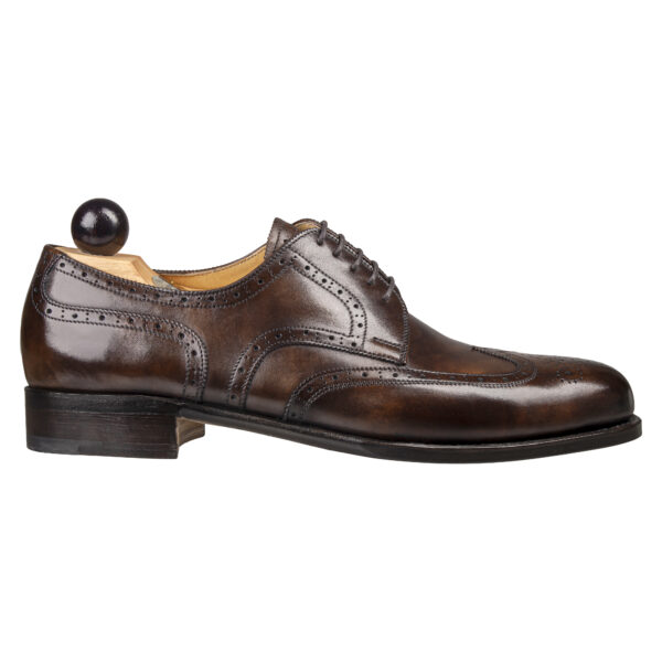 Side view-1 of men’s walnut museum calf Budapest Derby shoe on P2 last with a single leather sole – handmade by Vass Shoes.
