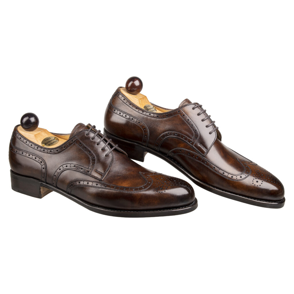 Side view-2 of men’s walnut museum calf Budapest Derby shoe on P2 last with a single leather sole – handmade by Vass Shoes.