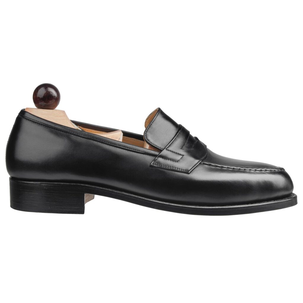 Side view-1 of men’s black calf Slipper II on P last with a single sole – handmade by Vass Shoes.