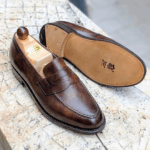 Angle view-2 of men’s walnut museum Slipper II on P last with a single sole – handmade by Vass Shoes.