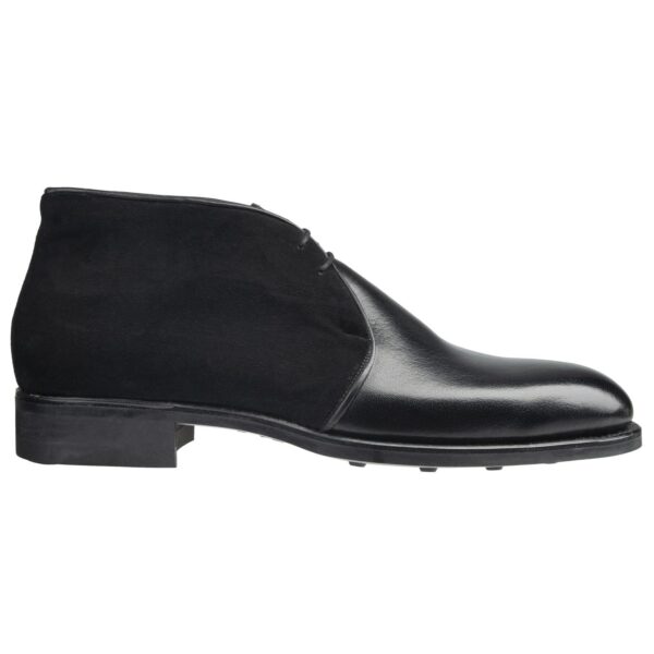 Side view-1 of men’s black 2-eyelet Chukka boots on F last with a dainite sole – handmade by Vass Shoes.
