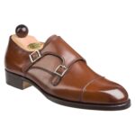 Angle view-1 of men’s antique cognac Double Monk on F last with a single leather sole – handmade by Vass Shoes.
