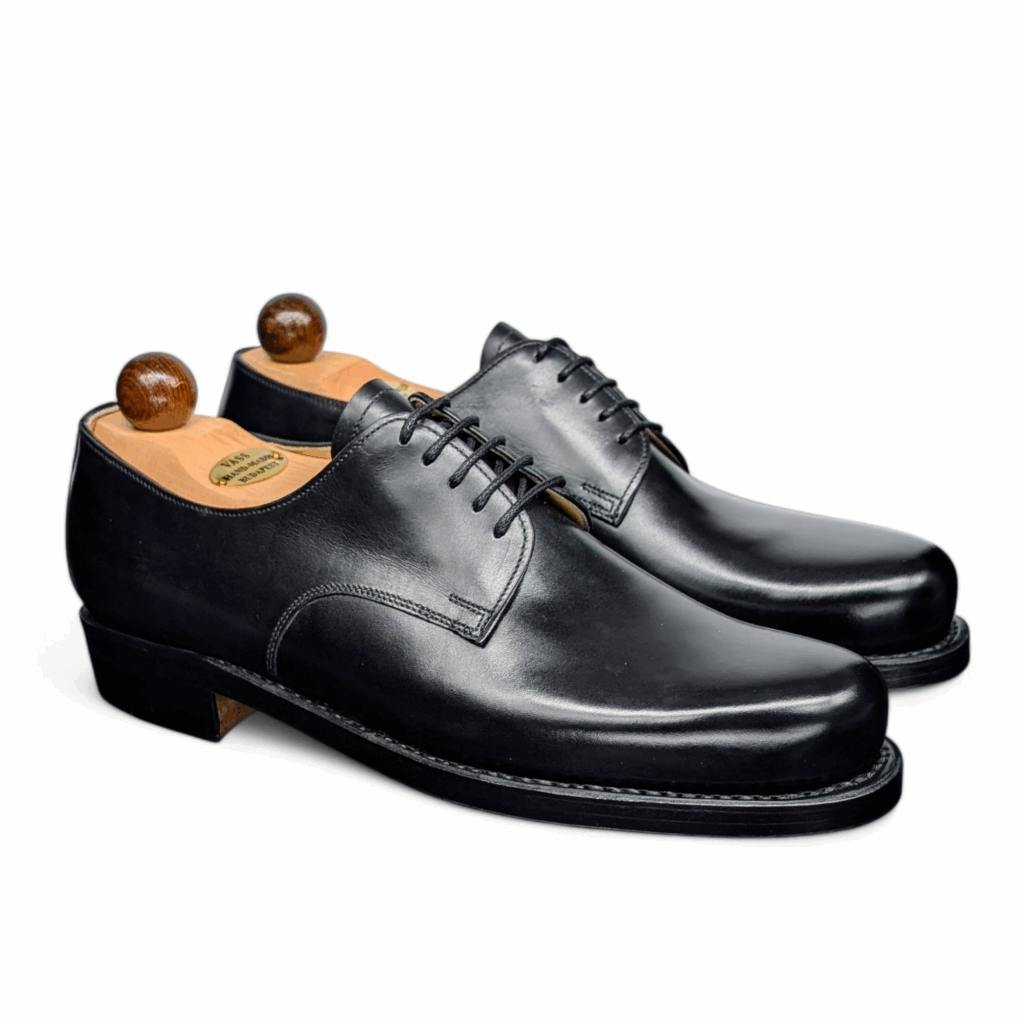 Side view-2 of men’s black derby London 5-eyelets shoe on BP last with a double sole – handmade by Vass Shoes.