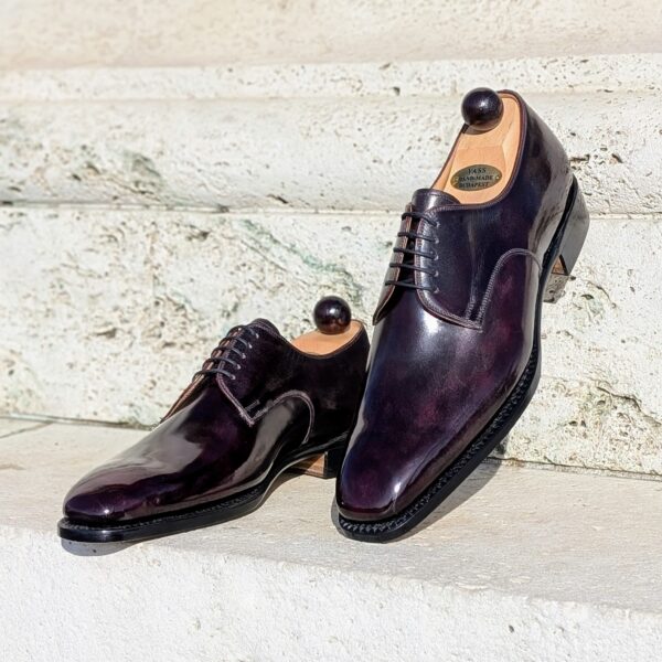 Angle view-1 of men’s bordeaux London 5-eyelets shoe on S last with a single sole – handmade by Vass Shoes.