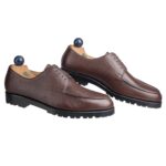 Side view-2 of men’s antique cognac scotchgrain Norweger shoe on P last with a vibram sole – handmade by Vass Shoes.
