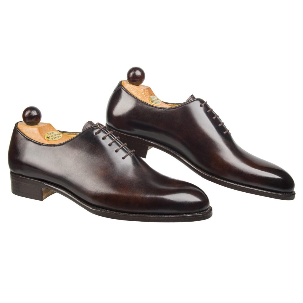 Side view-2 of men’s brown Wholecut 5-eyelets on F last with a single sole – handmade by Vass Shoes.