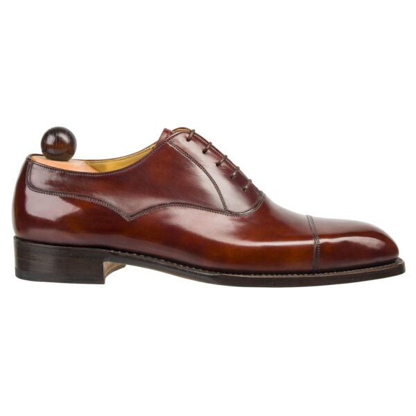 Side view of men’s gold museum calf Alt English II plain Oxford shoe on K last with a single sole – handmade by Vass Shoes.