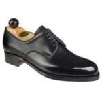 Angle view of men’s black London 5-eyelets shoe on P2 last with a single sole – handmade by Vass Shoes.