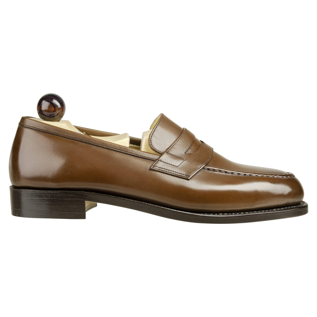Side view-1 of men’s antique cognac Slipper II on P last with a single sole – handmade by Vass Shoes.
