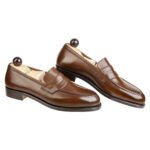 Side view-2 of men’s antique cognac Slipper II on P last with a single sole – handmade by Vass Shoes.