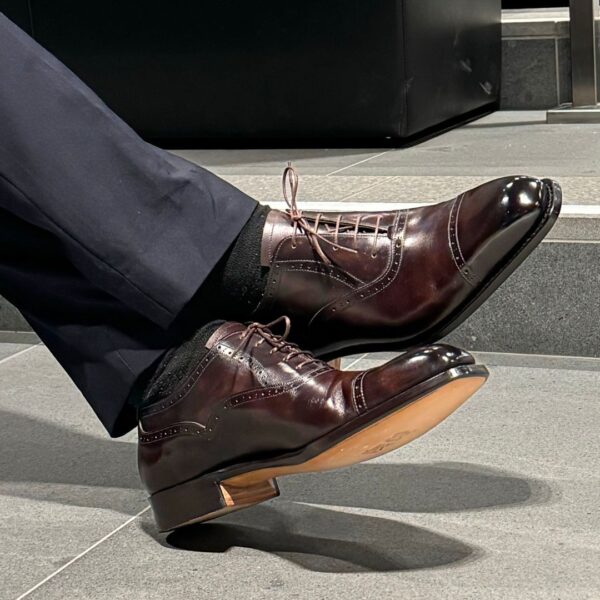 Angle view-1 of men’s brown museum Alt English II brogue Oxford shoe on K last with single sole – handmade by Vass Shoes.