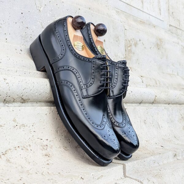 Side view-1 of men’s black calf Budapest Derby shoe on BP last with a double leather sole – handmade by Vass Shoes.