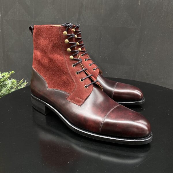 Angle view-1 of men’s bordeaux Valway high boots on F last with a dainite sole – handmade by Vass Shoes.