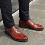 Angle view of men’s gold museum calf cap toe Oxford shoe on P2 last with a single sole – handmade by Vass Shoes.