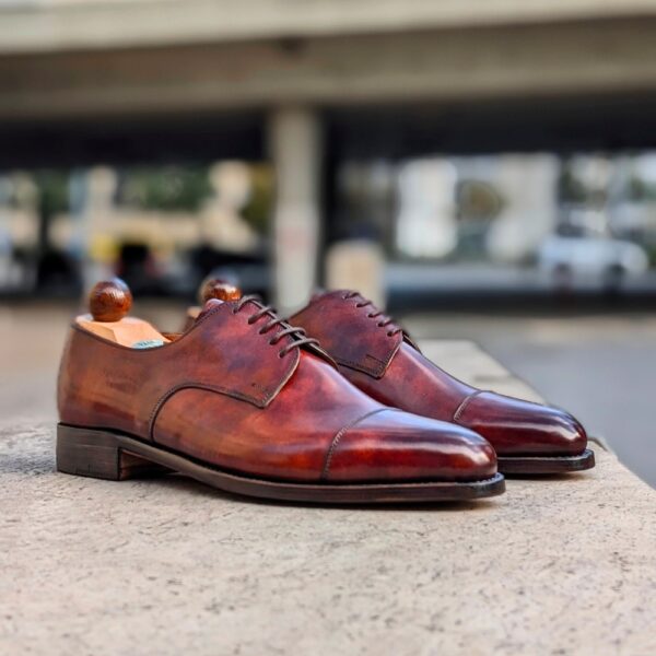Side view of men’s gold museum Theresianer shoe on P2 last with a single sole – handmade by Vass Shoes.