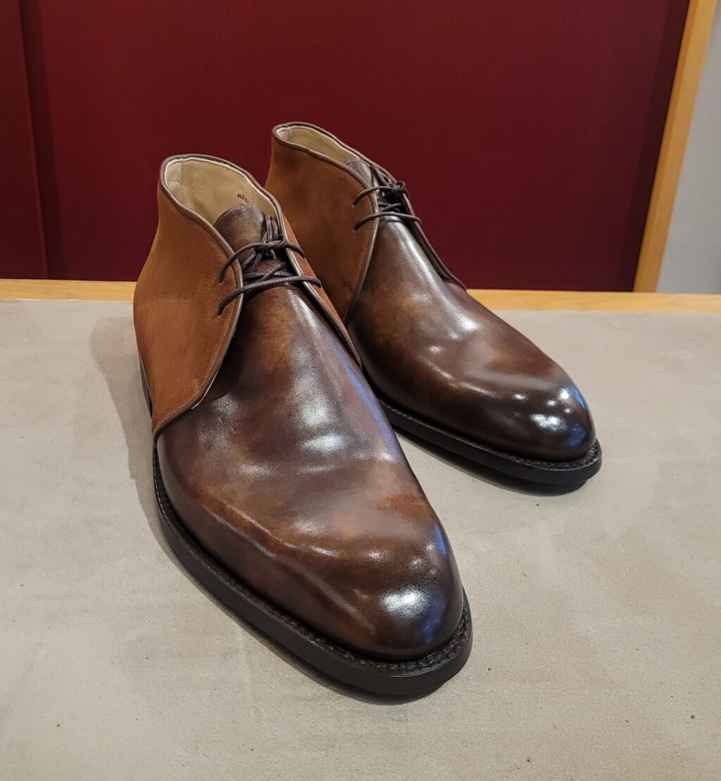 Vass-Shoes-Chukka-boots-two-eyelet-model-F-last-walnut-museum-calf-and-suede-dainite-rubber-sole-angle-view