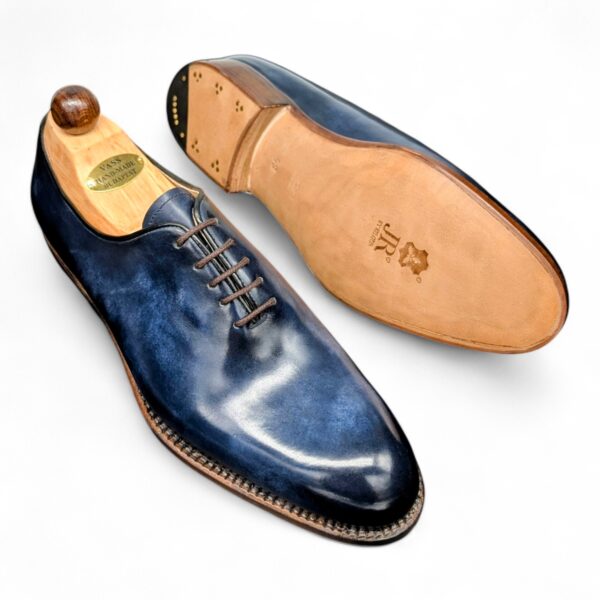 Angle view-2 of men’s blue museum Wholecut 5-eyelets on F last with a single sole – handmade by Vass Shoes.